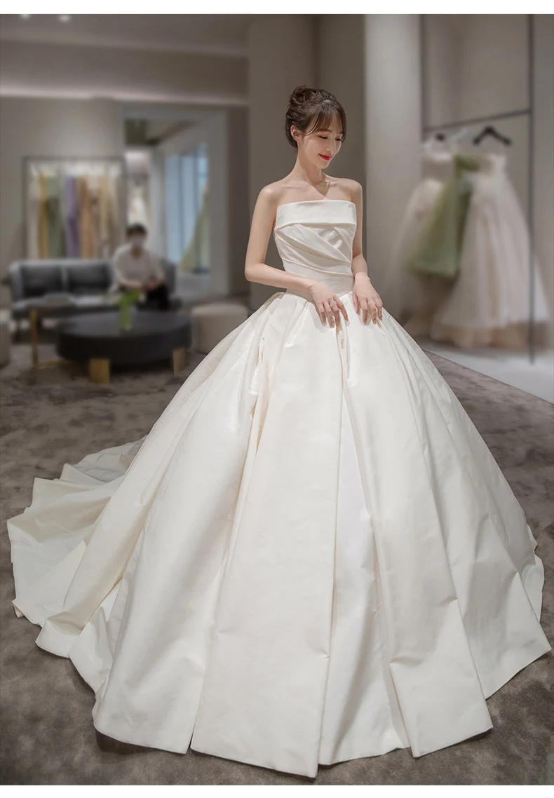 Women's satin tube top elegant French style wedding dress, featuring a simple design, a large tail, perfect for a sophis — photo 10