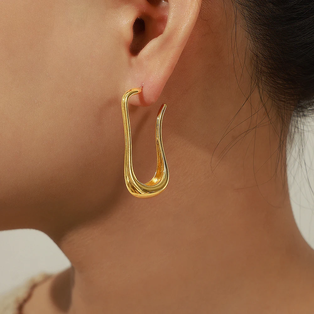 Brincos femininos de cobre com design irregular e simples, moda fashion, perfeitos para adicionar um toque moderno e estiloso ao seu visual. — foto 2
