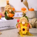 Chapéu de pelúcia da época da colheita com boneca de abóbora sem rosto, adorno aconchegante e festivo para outono e inverno. — foto 4