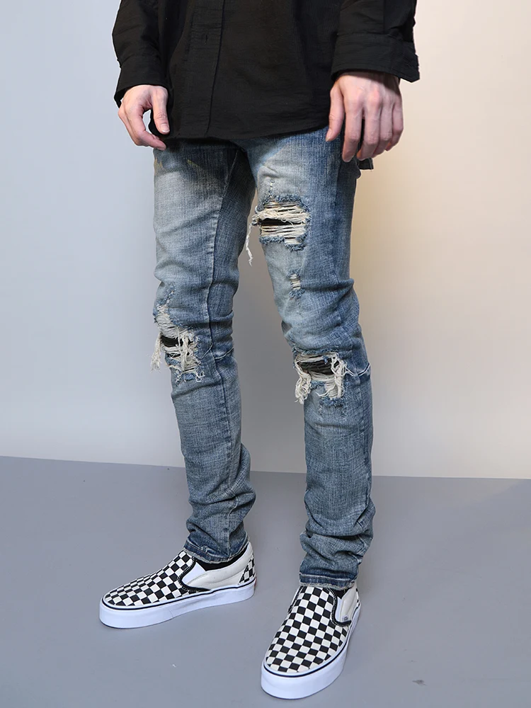 Heren Ripped Washed Blue Denim Jeans, voor een stoere look. Deze jeans combineert comfort met een trendy uitstraling, ideaal voor dagelijks gebruik. — foto 3