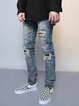 Heren Ripped Washed Blue Denim Jeans, voor een stoere look. Deze jeans combineert comfort met een trendy uitstraling, ideaal voor dagelijks gebruik. — foto 3