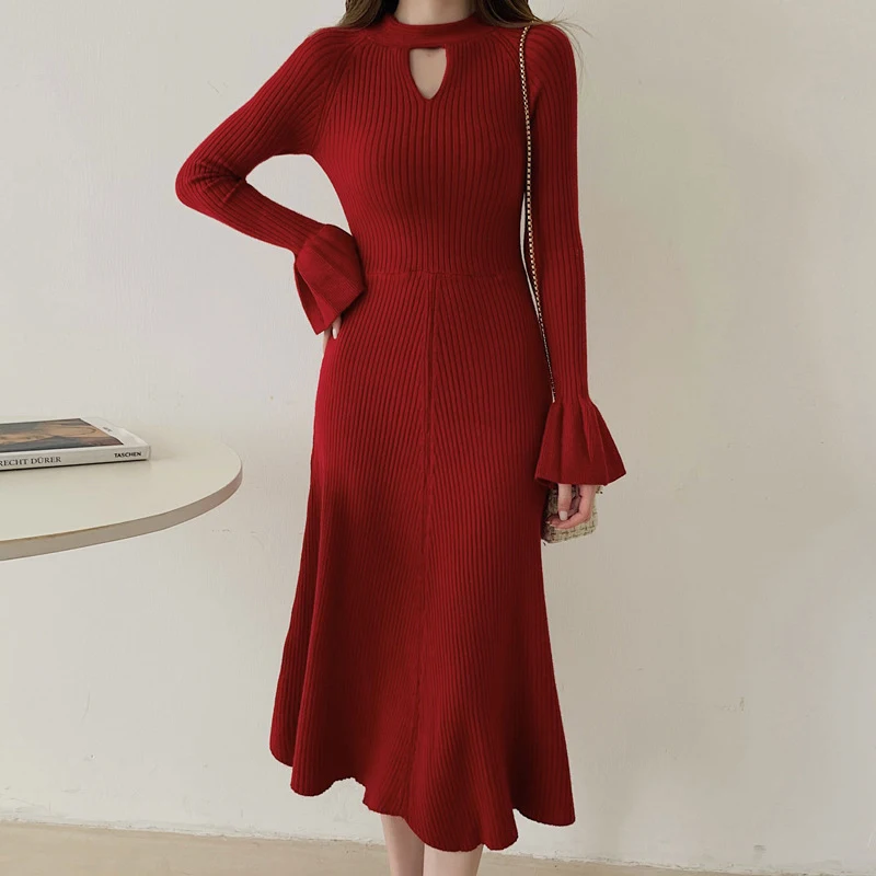 Vestido suéter Temperamento Retro com base acolchoada e malha francesa. Conforto e estilo vintage para um visual elegante e aconchegante. — foto 1