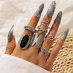 Conjunto de anéis com gotejamento de óleo preto, cauda de peixe geométrica e vazada, um acessório moderno e estiloso. — foto 5