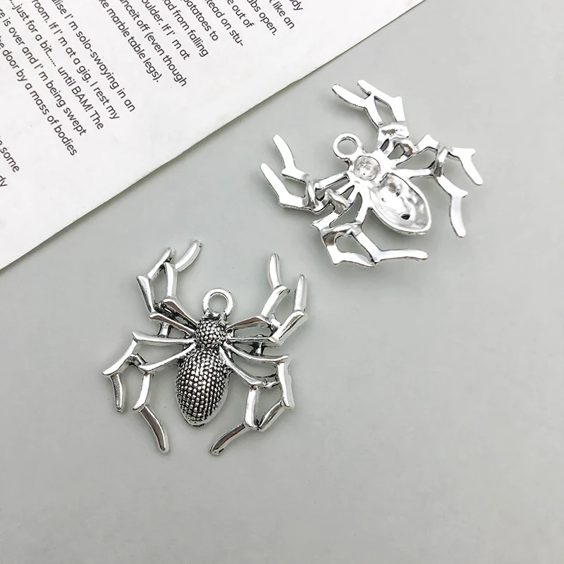 Zinklegering spin-accessoires hanger. Een uniek ontwerp dat een vleugje mysterie en elegantie aan je stijl toevoegt. Perfect voor cadeaus of dagelijks gebruik. — foto 15