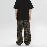 Pantalones cargo camuflaje para exteriores con ajuste de forma en las piernas y diseño adaptable para actividades al aire libre. — foto 8