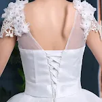 Long trailing lace tie wedding dress, slim and sleek. A beautiful choice for your special day, flattering and elegant. E — photo 1