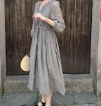 Letnia sukienka z haftem, z rękawami typu latarnia i spódnicą midi. Idealna na ciepłe dni. Wygoda i elegancja. — zdjęcie 5