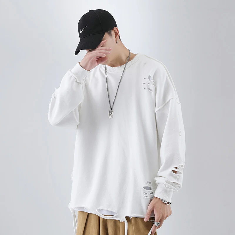Suéter masculino folgado rasgado, estilo urbano moderno. Conforto e estilo em uma peça, perfeito para um visual despojado e cheio de atitude, ideal para o dia a dia. — foto 1