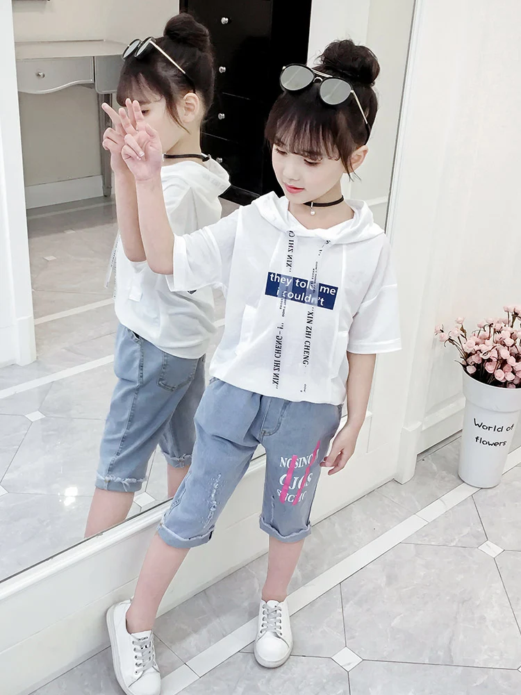 Roupa infantil de verão "net red", moda para crianças, frescor e estilo garantidos. Conforto e beleza para os dias ensolarados dos pequenos. — foto 1