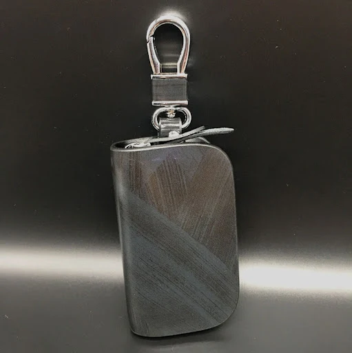 Title 2, Waist padlock key case for secure key storage. ...