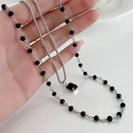 Colar gêmeo de ónix preto de camada dupla. Um acessório elegante para casais, um presente especial e uma declaração de estilo sofisticada e moderna. — foto 4