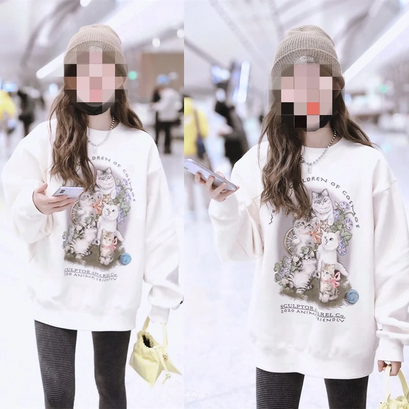 Suéter feminino solto com gola redonda e desenho de desenho animado de comprimento médio, perfeito para um look casual e confortável. — foto 11
