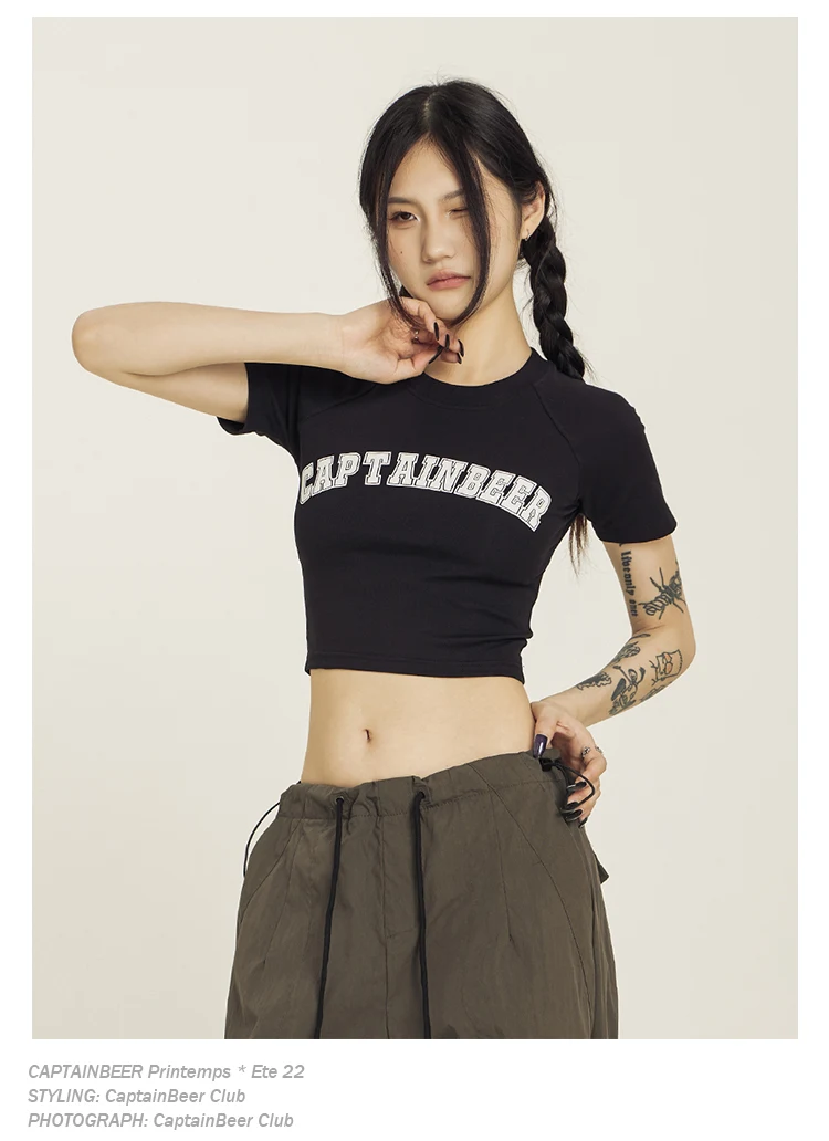 Camiseta de verano para mujer, estilo retro americano, cuello redondo, manga corta, diseño de chica sexy, corte en el ombligo, moda. — foto 15