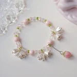 Pulseira de contas de cristal arco-íris gradiente, borboleta, Linglan, tulipa com flores - Adicione um toque vibrante e elegante ao seu visual. — foto 1