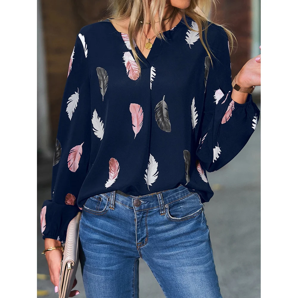 Damesmode V-hals top met losse pasvorm, elegant en stijlvol. Ideaal voor een comfortabele en modieuze look, perfect voor dagelijks gebruik. — foto 2