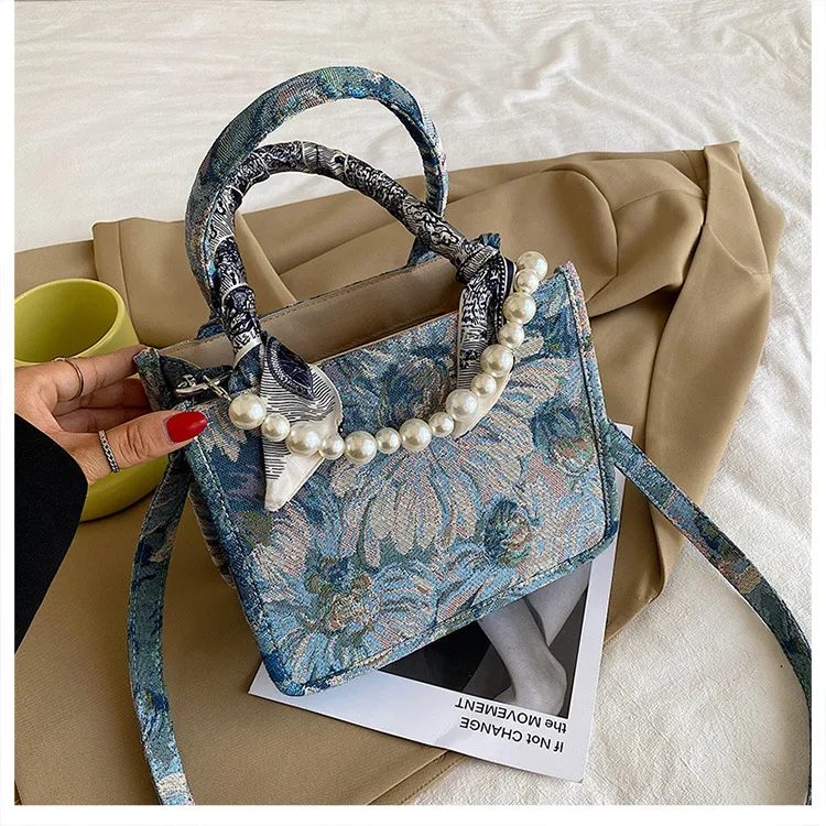 Bolsa mensageiro feminina estampada de grande capacidade, ideal para transportar tudo o que você precisa com estilo e praticidade no dia a dia. — foto 2