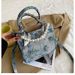 Bolsa mensageiro feminina estampada de grande capacidade, ideal para transportar tudo o que você precisa com estilo e praticidade no dia a dia. — foto 2