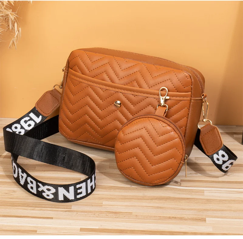 Bolsa câmera transversal com padrão de ondas e fita, perfeita para transportar seu equipamento fotográfico com segurança, estilo e praticidade. — foto 4