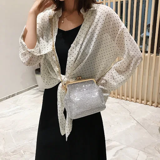 Title 9, Versatile water drill clip chain shoulder bag. ...