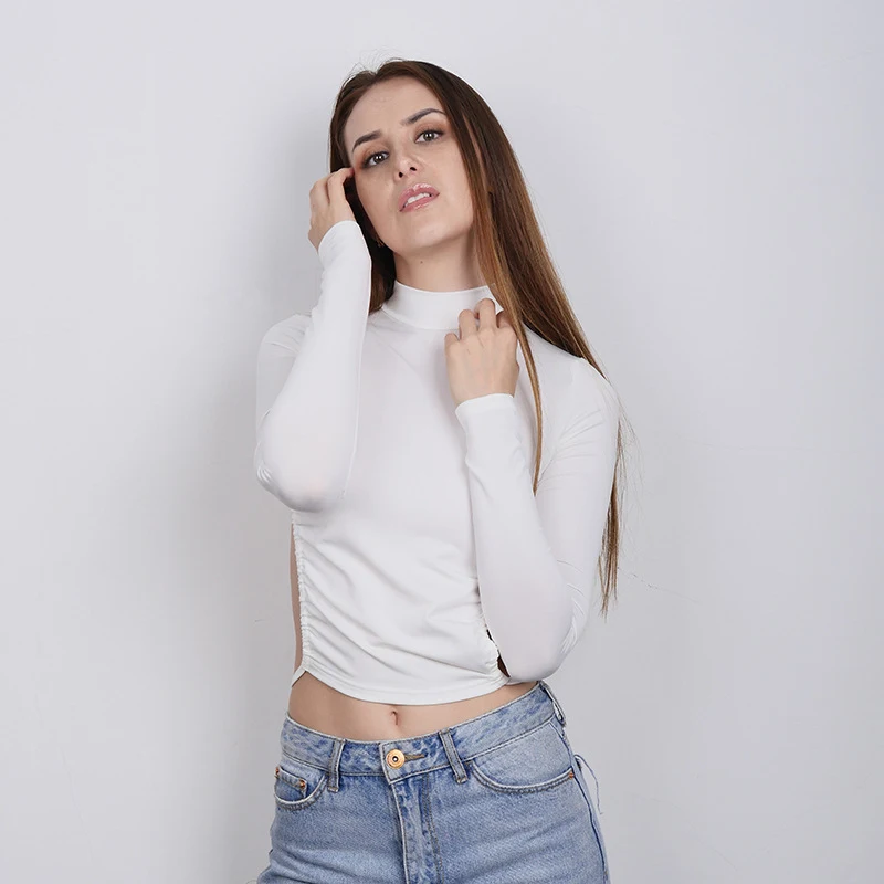 Long-sleeved shirt with exposed navel and strap bottom, perfect for a stylish and flattering, trendy everyday look. — photo 21