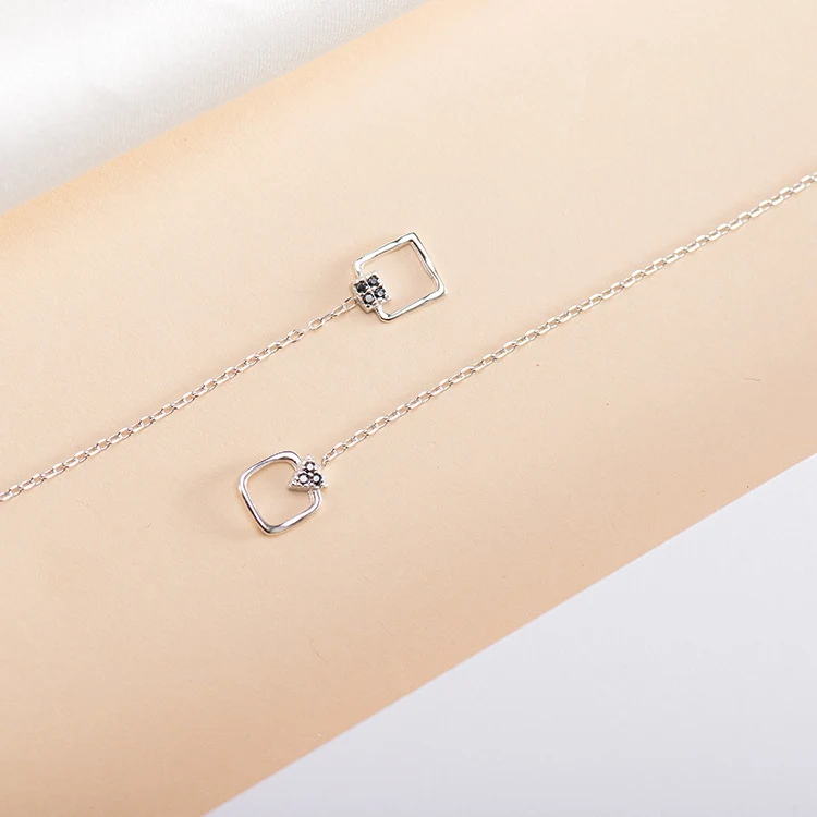 Title 5, Pendientes largos con diamantes para un brillo ...