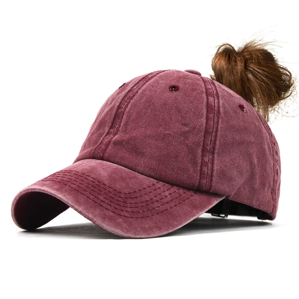 Title 1, A ladys ponytail baseball cap that goes with e...