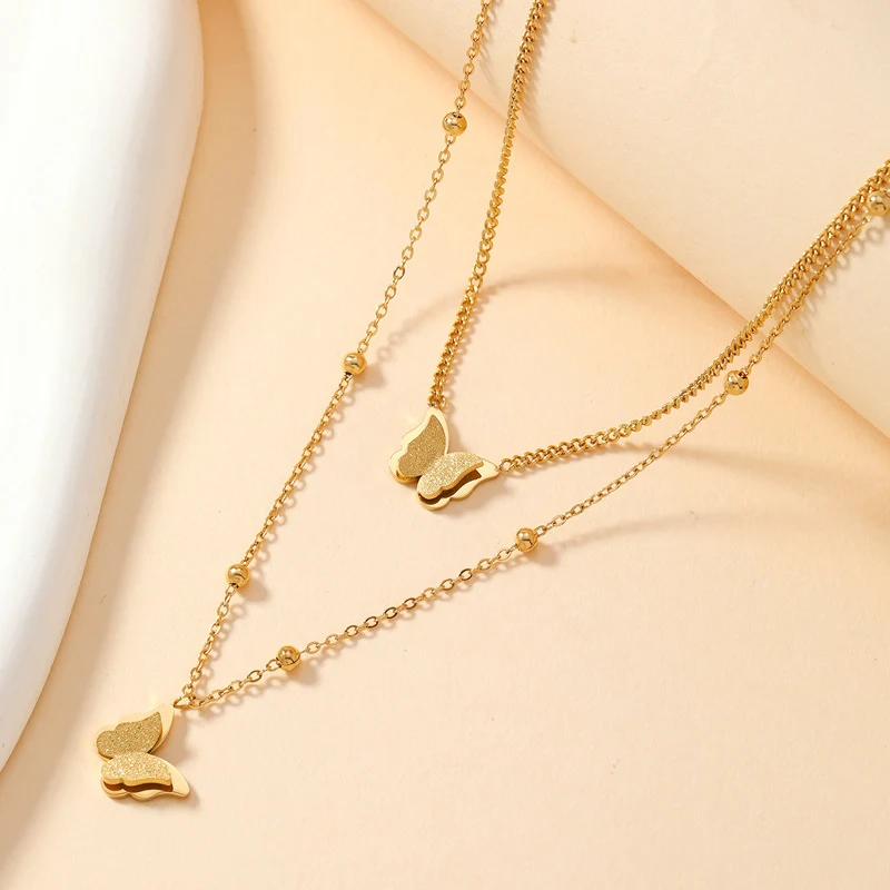 Title 2, Collana da donna con farfalla smerigliata a dop...
