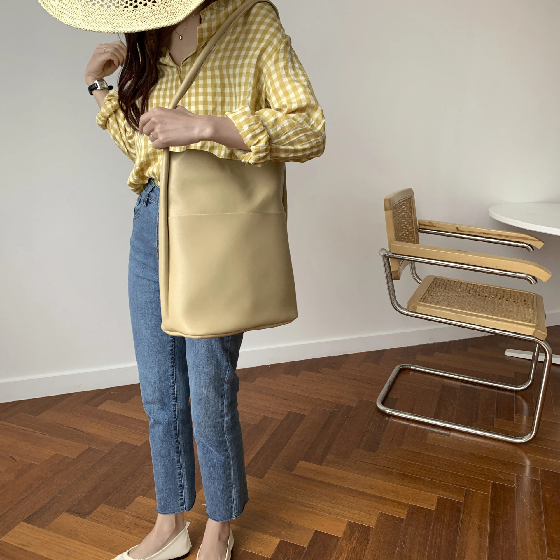 Title 10, Simple shoulder bag designed for everyday use. ...