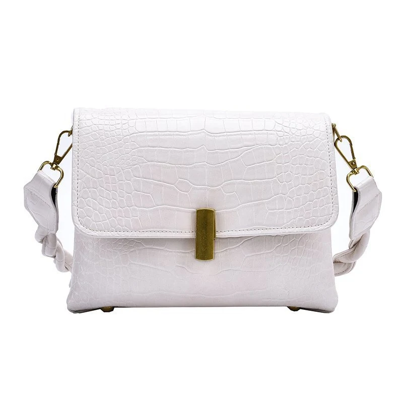 Title 4, Textured large capacity messenger bag. Carry ev...