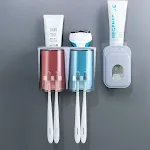 Two cups and toothpaste squeez