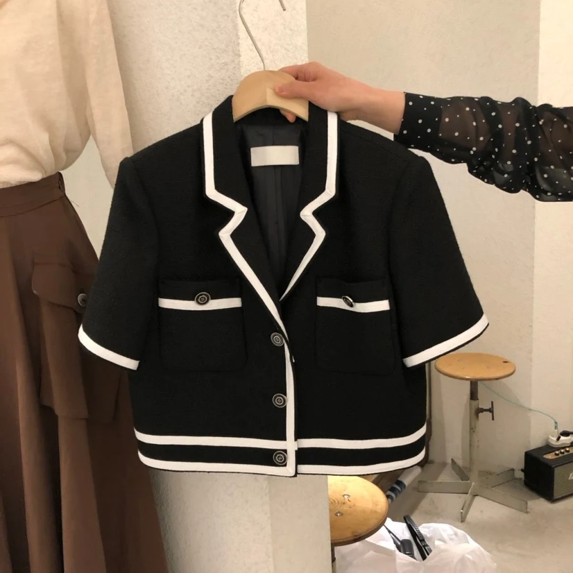 Modieuze blazer met kleine geur, revers en knoopsluiting met korte mouwen — foto 5