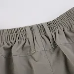 Short asymétrique taille basse pour femme, tissé et décontracté, idéal pour un look casual et confortable, parfait pour les journées ensoleillées. — photo 9