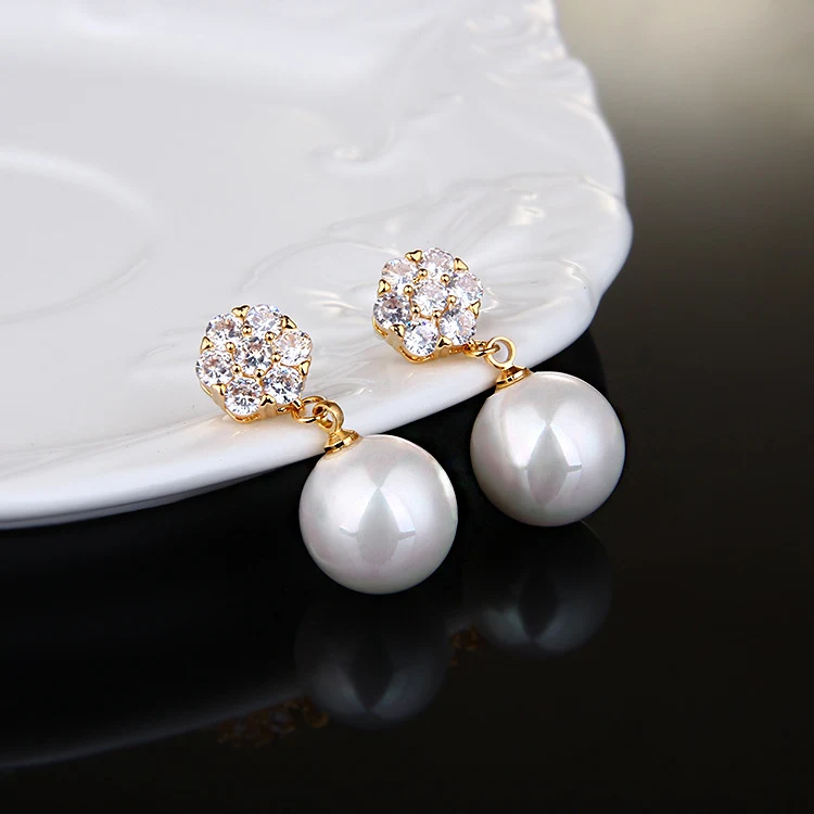 Brincos longos de pérolas redondas. Elegância atemporal para realçar seu visual. Perfeitos para qualquer ocasião, design sofisticado e feminino. — foto 5