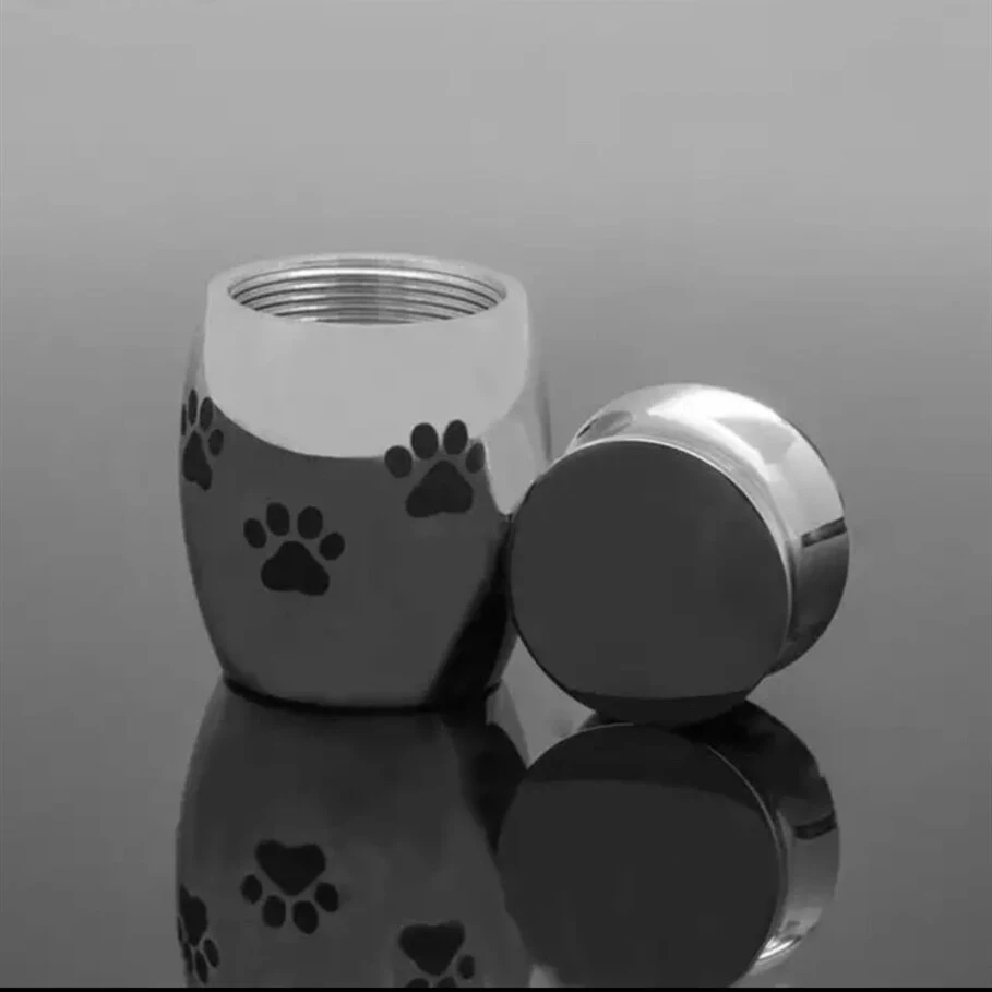Urna memorial para pet de aço inoxidável, com pegada de pata e osso. Caixa à prova de umidade, personalizável, para cães e familiares. — foto 7
