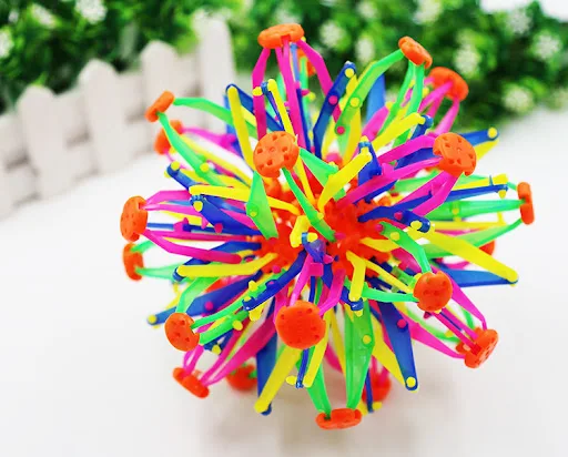 Title 4, Catch and Kick the Blossoming Ball Magic Toy. T...