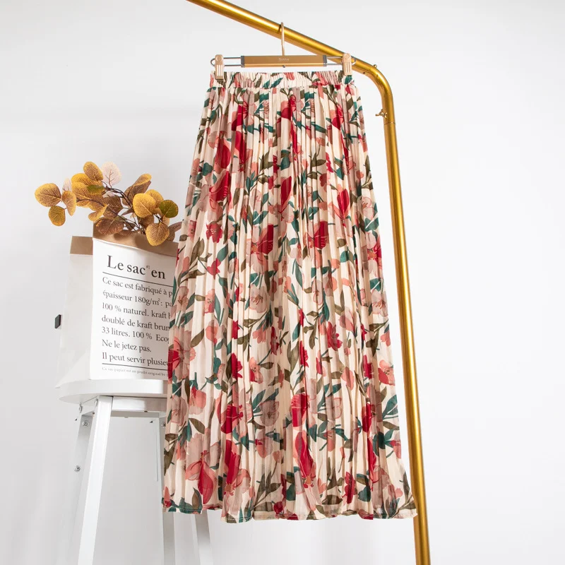 Title 9, Mid-Length Chiffon Pleated Floral Skirt. Effort...