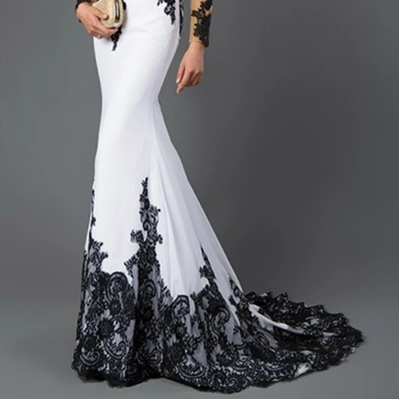 Vestido longo de renda bordada com cauda sereia, corte justo. Elegância e sofisticação para eventos especiais, realçando sua beleza e forma. — foto 4