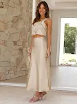 Vestido de cetim acetinado com top curto de um ombro só, perfeito para eventos. Elegância e modernidade em uma peça deslumbrante. — foto 14