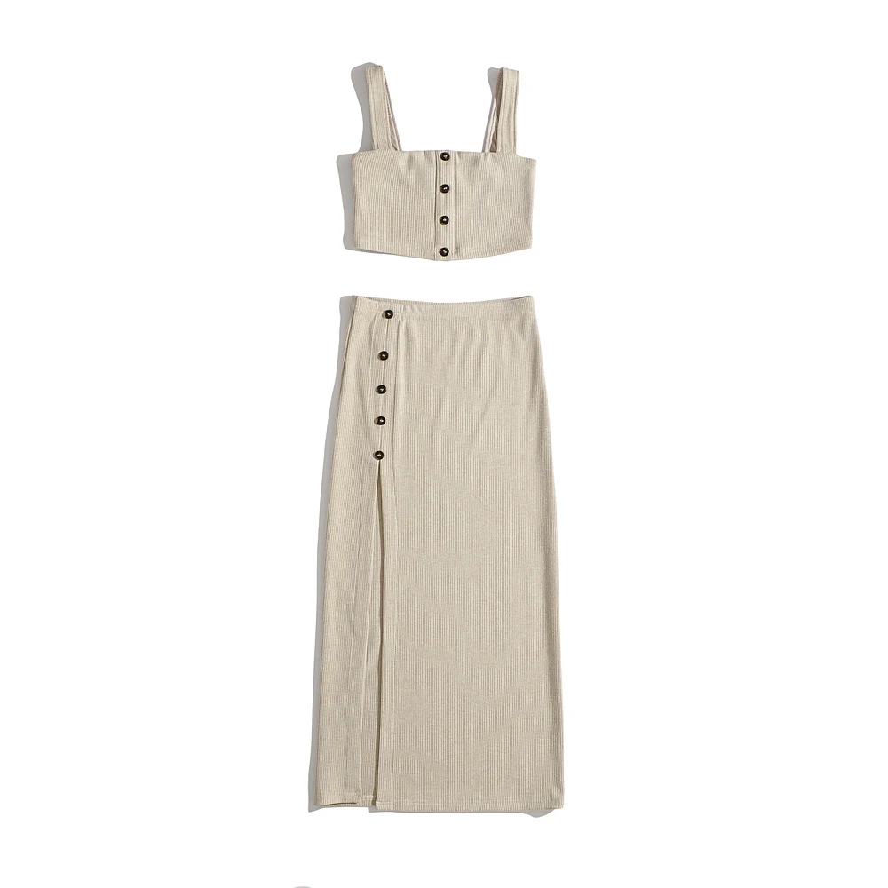 Conjunto de saia de cintura alta em malha elástica com fenda traseira, ideal para um look moderno e confortável. Perfeito para diversas ocasiões. — foto 1