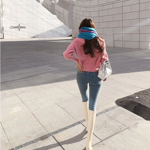 Title 3, Pointed toe stiletto high boots, designed to el...