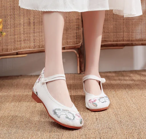 Title 41, Embroidered Flower Pumps for Women, designed to...