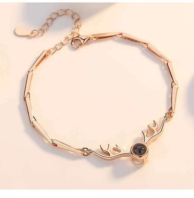 Title 4, Pulseira "One Deer" com "Eu te amo" em 100 idio...