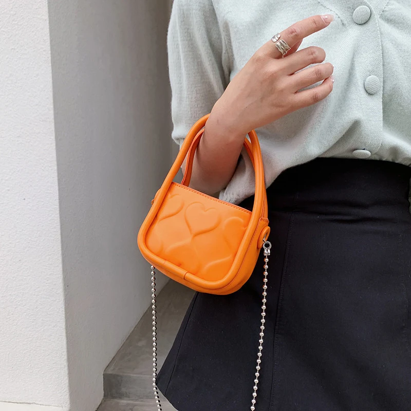 Bolsa mensageiro portátil feminina Flow em forma de coração, corrente pequena, moda um ombro, perfeita para uso diário. — foto 12