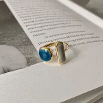 Anel de zircônia com esmalte dourado gotejante Niche Design Sense para mulheres, elegância e sofisticação. — foto 7