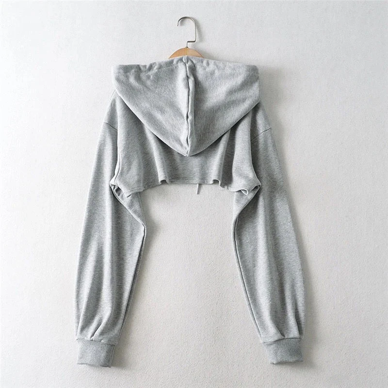 Top cropped de manga longa com personalidade irregular estilo Ins. Adicione um toque moderno e único ao seu visual, ideal para diversas combinações. — foto 1