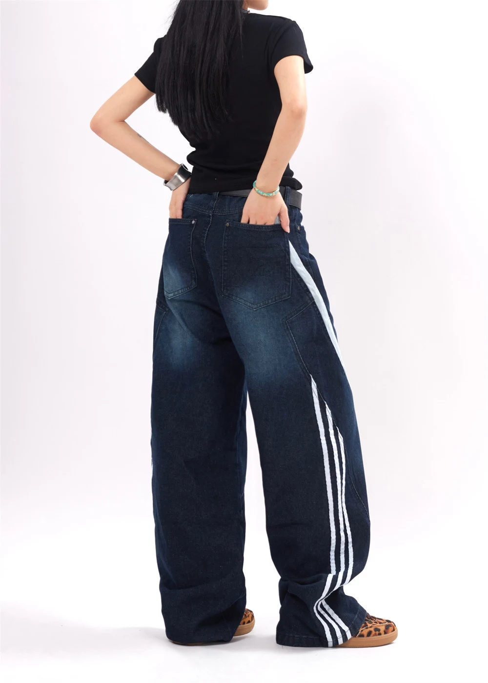 Irregular Striped Wide Leg Jeans for Men and Women. Experience comfort and style. These jeans offer a relaxed fit and a — photo 4