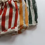 Calças listradas cropped folgadas para meninas. Conforto e estilo em uma peça. Perfeitas para o verão, soltinhas e charmosas para diversas ocasiões. — foto 8