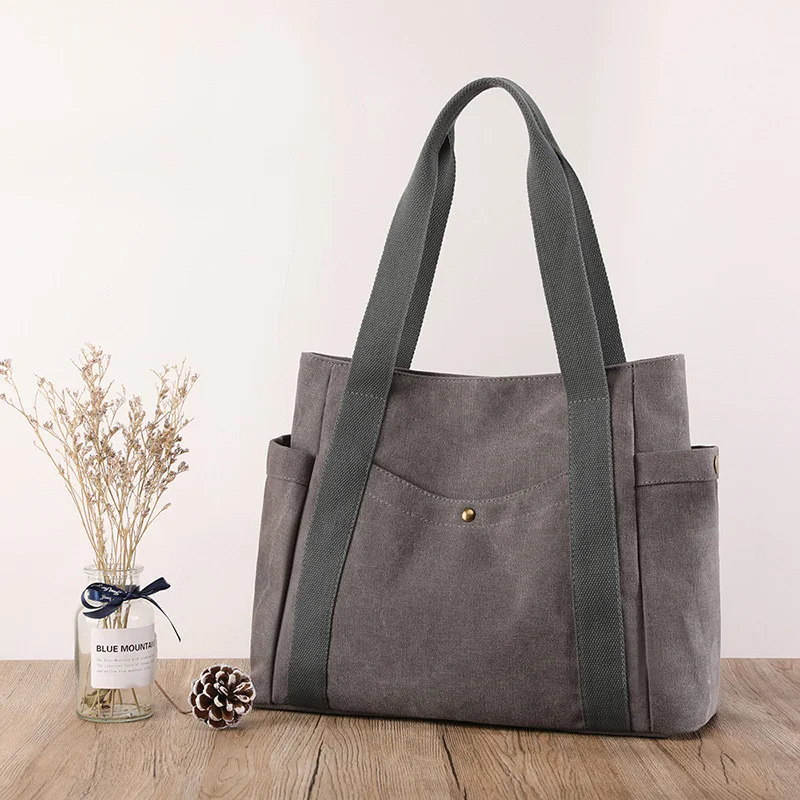 Bolsa de ombro feminina grande capacidade com múltiplos bolsos, bolsa de tecido espaçosa e prática para o dia a dia, organizada e versátil. — foto 6