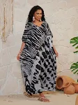 Camisa Robe Solta Feminina para Férias com Proteção Solar, ideal para praia, piscina ou passeios, leve e confortável para o verão. — foto 5