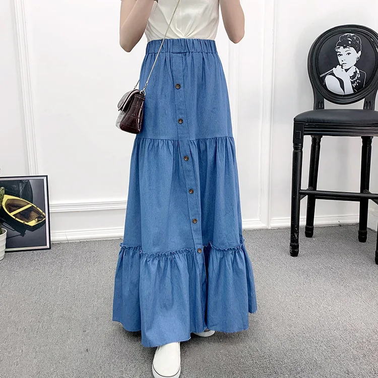 Saia jeans vintage minimalista evasê com cintura alta elástica, design atemporal, conforto e estilo para looks casuais e sofisticados. — foto 8